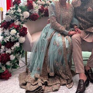 Elegant Embroidered Outfit with Gold Accents